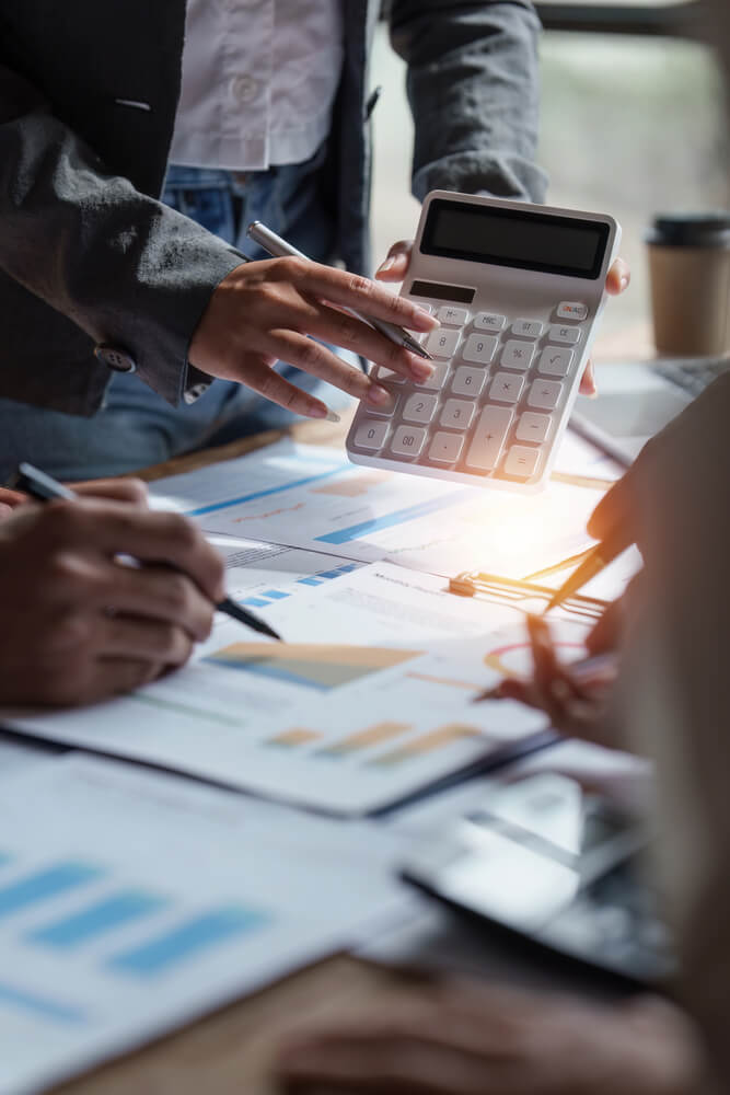 CPA-led financial accountants looking over financial documents.