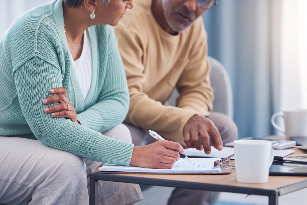 Trustee accountants looking at financial documents